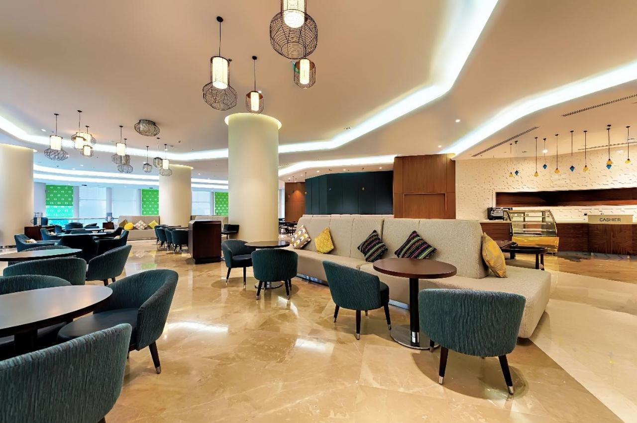 מכה Holiday Suites Al Azizia מראה חיצוני תמונה The hotel's lobby