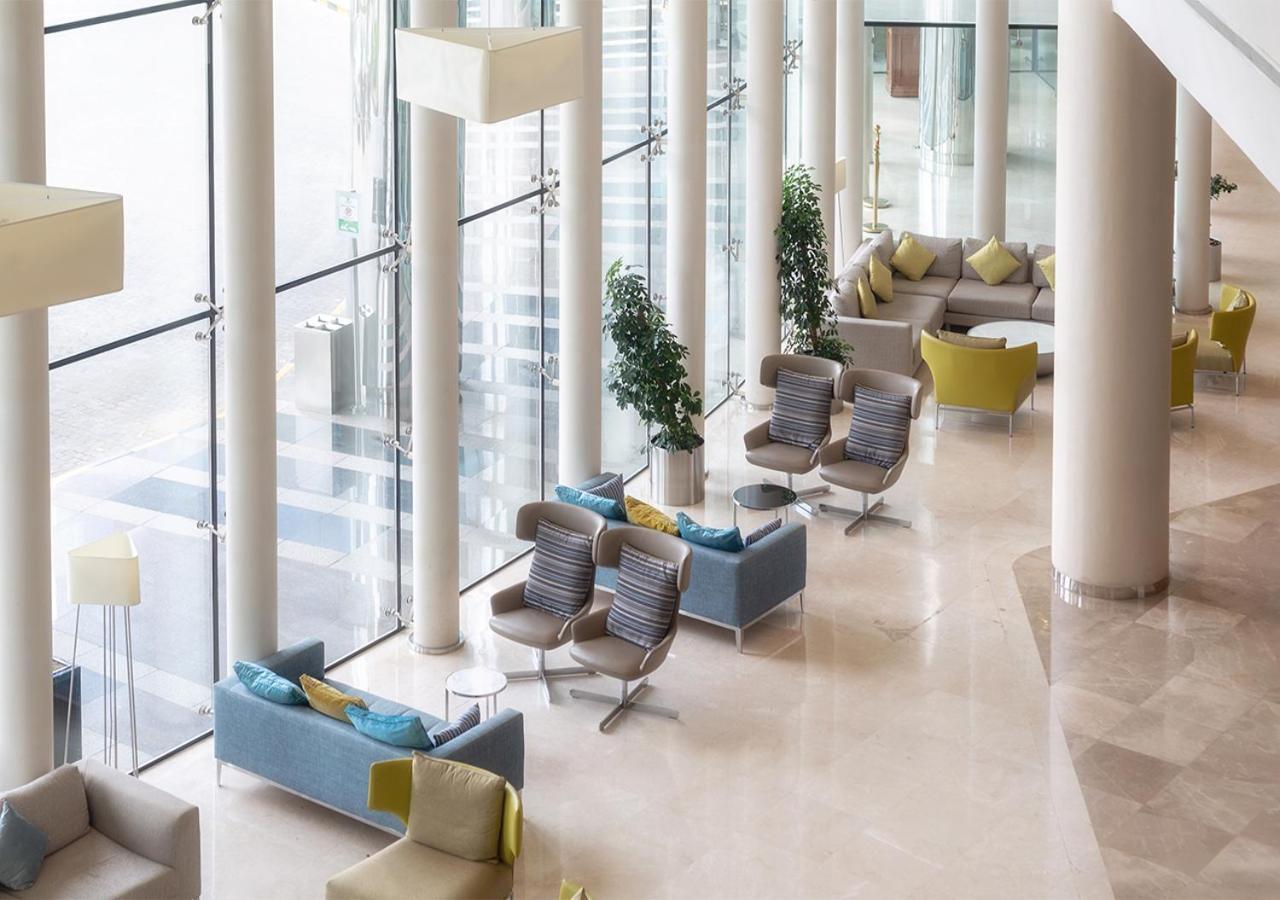 מכה Holiday Suites Al Azizia מראה חיצוני תמונה The hotel lobby