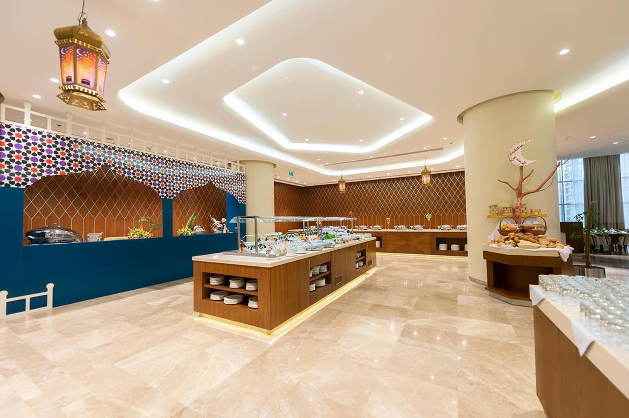 מכה Holiday Suites Al Azizia מראה חיצוני תמונה The hotel's restaurant