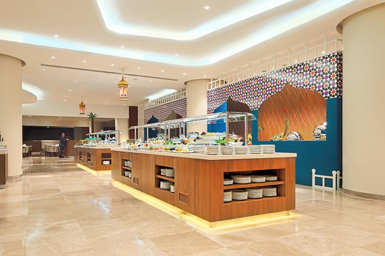 מכה Holiday Suites Al Azizia מראה חיצוני תמונה The hotel's restaurant